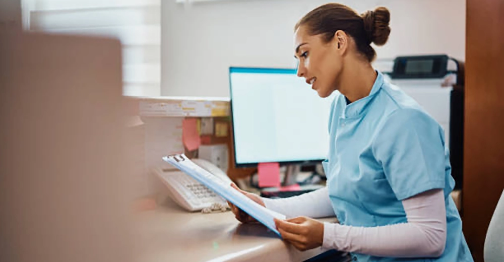 Provider reviewing paperwork