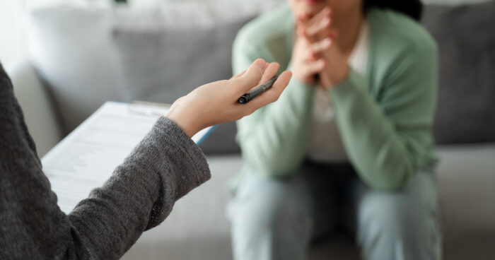 Psychologist doctor examine and listen and talking to patient with depression, anxiety